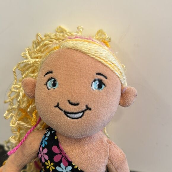 Denell -A blonde with a black floral dress.- Manhattan Toys. Size 13” - Picture 2 of 8